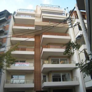 ΕΠΤΑΟΡΟΦΗ ΟΙΚΟΔΟΜΗ ΜΕ ΥΠΟΓΕΙΟ PILOTIS ΚΑΙ ΔΩΜΑ